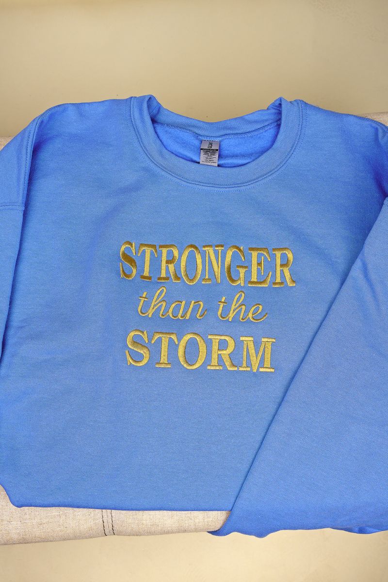 Embroidered Stronger Than The Storm Unisex NuBlend Crew product image 1